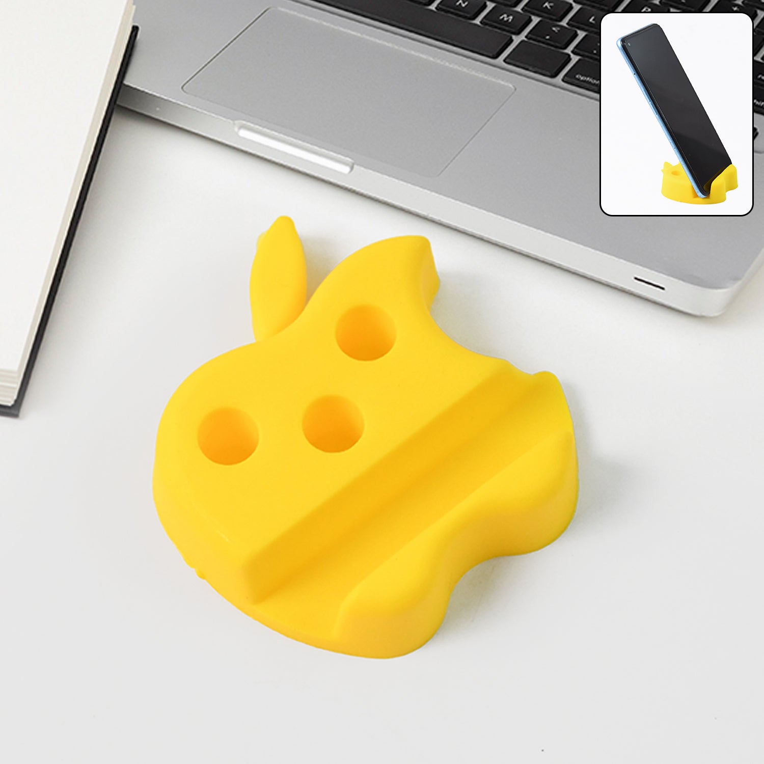 Multi-functional apple shape phone stand with pen holder on workspace