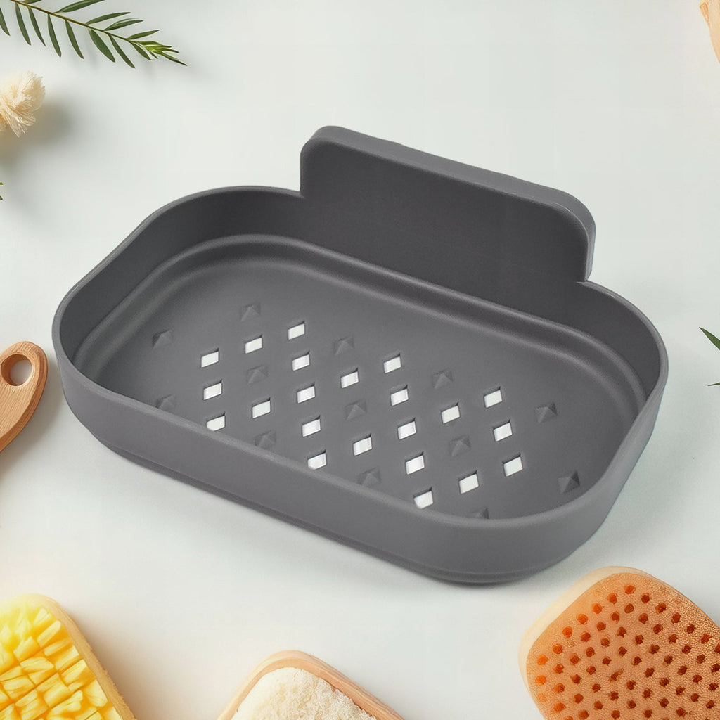 Dark gray soap holder tray with square drain holes and raised backrest