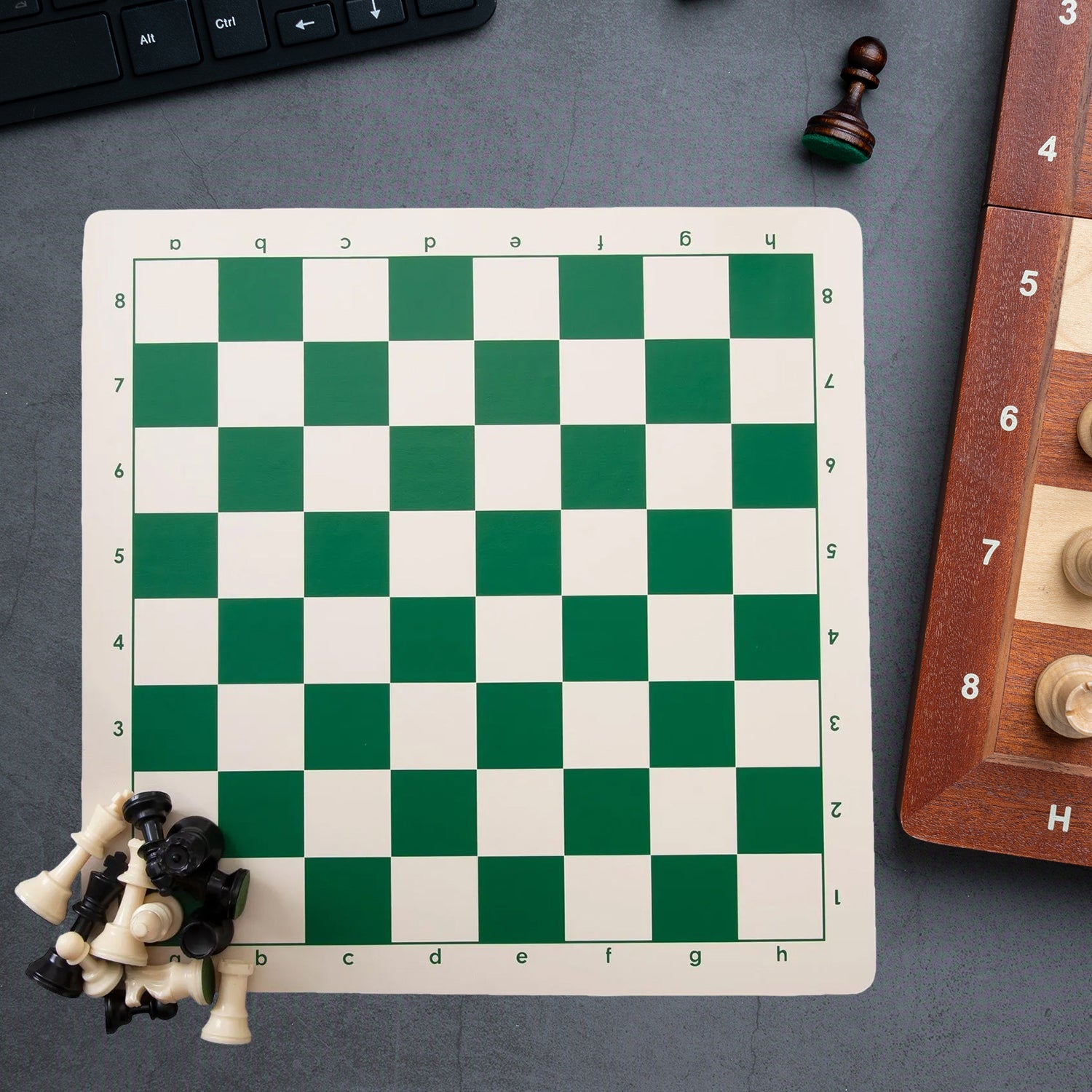Close up of plastic chess pieces on portable foldable chessboard