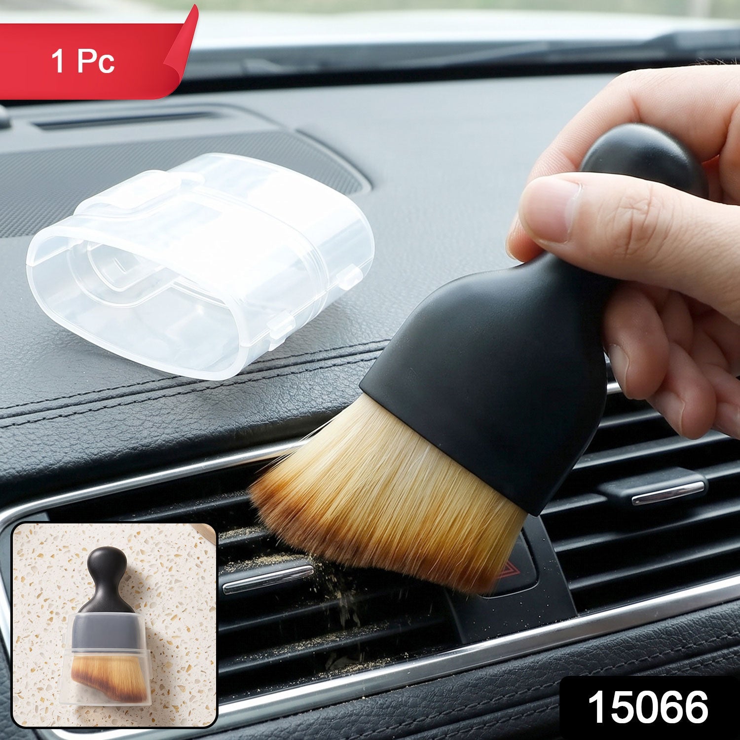 Mini car interior cleaning brush with black handle and soft tan bristles near car vent