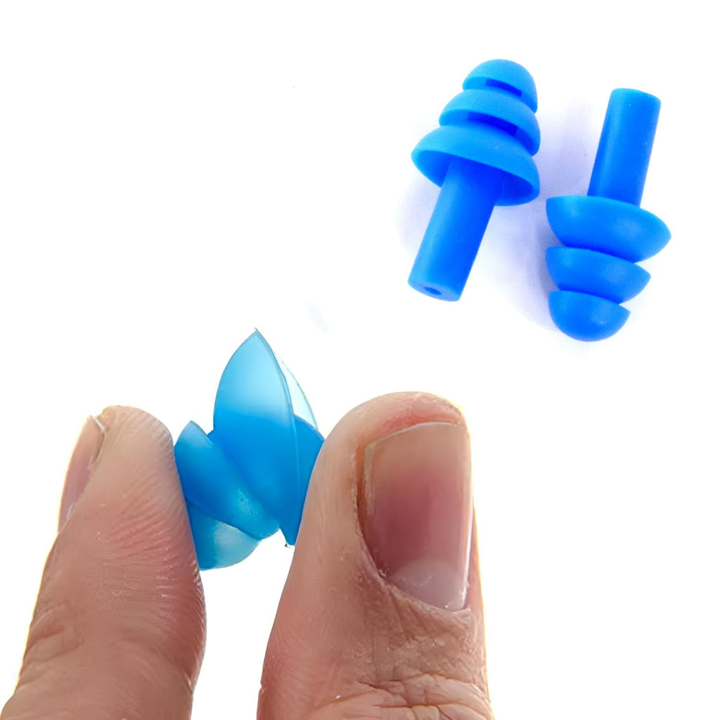 Close-up: blue reusable silicone ear plugs inserted into an ear