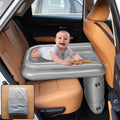 Gray inflatable air bed mattress for car back seat, folded pack shown inset