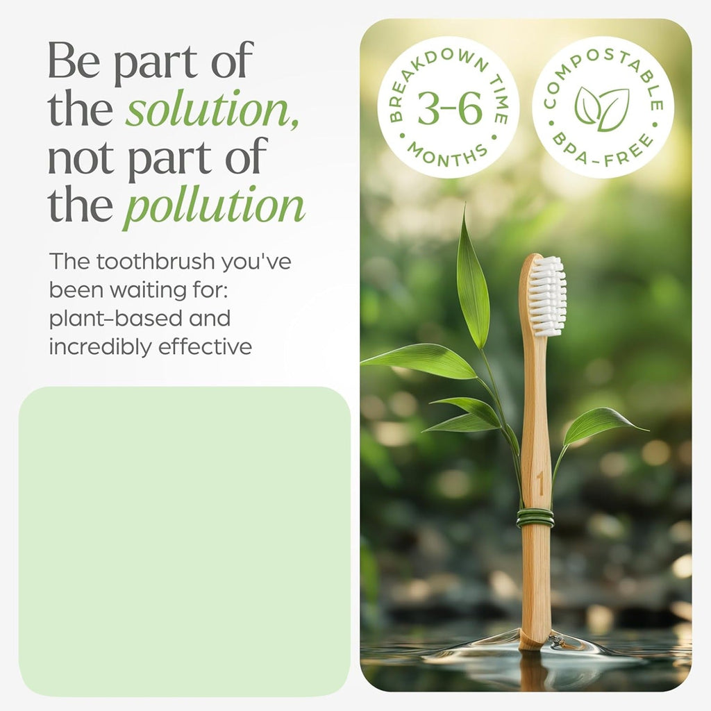 Bamboo toothbrushes with soft bristles floating in water beside green leaves