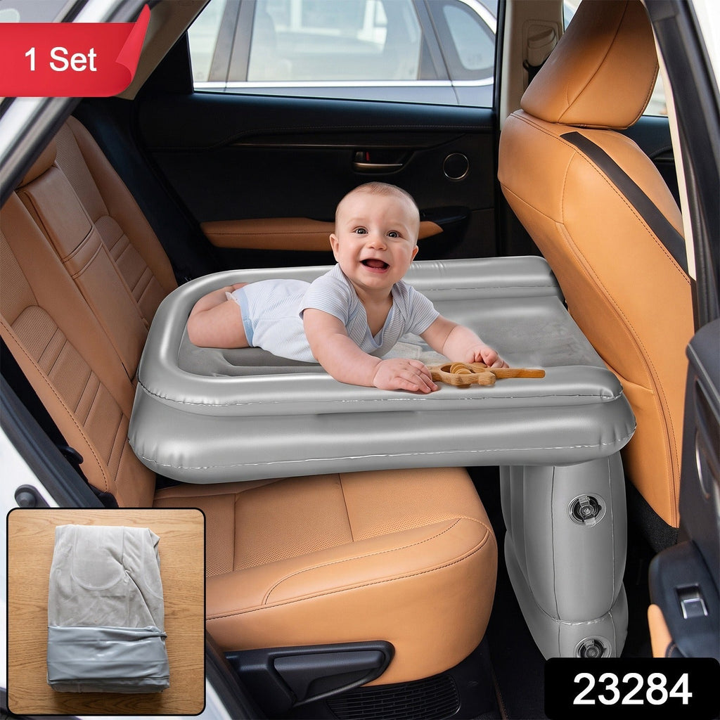 Gray inflatable air bed mattress placed on car back seat