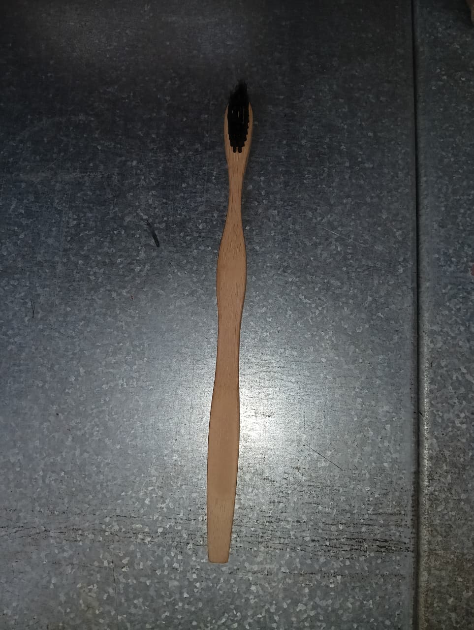 Bamboo toothbrush with charcoal bristles