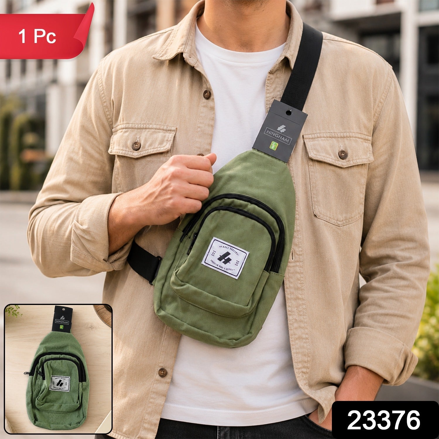 Men’s green canvas crossbody sling bag with front zip pocket, label patch, and black strap