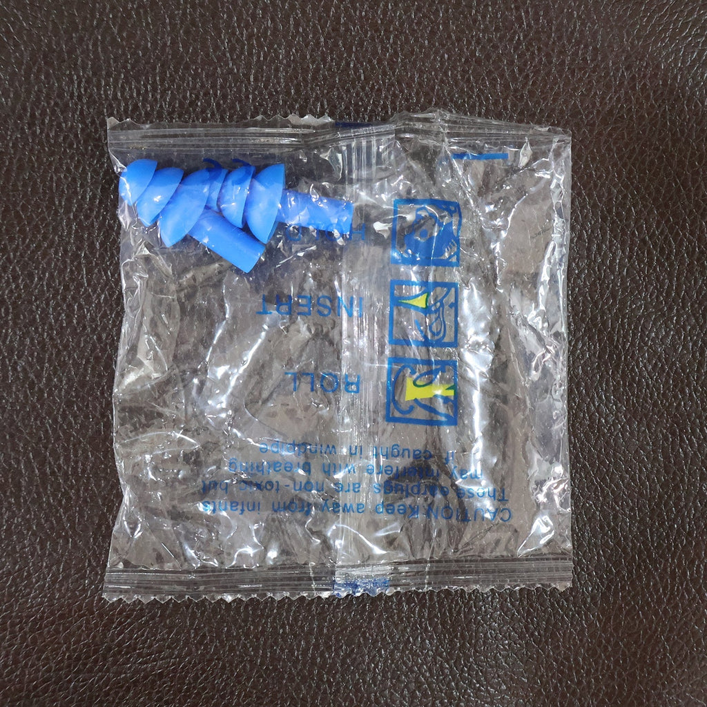 Clear plastic pouch containing blue reusable silicone ear plugs