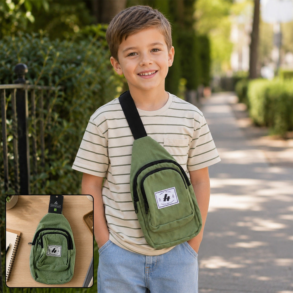 Kids green canvas sling crossbody chest bag with front zip pocket and adjustable strap