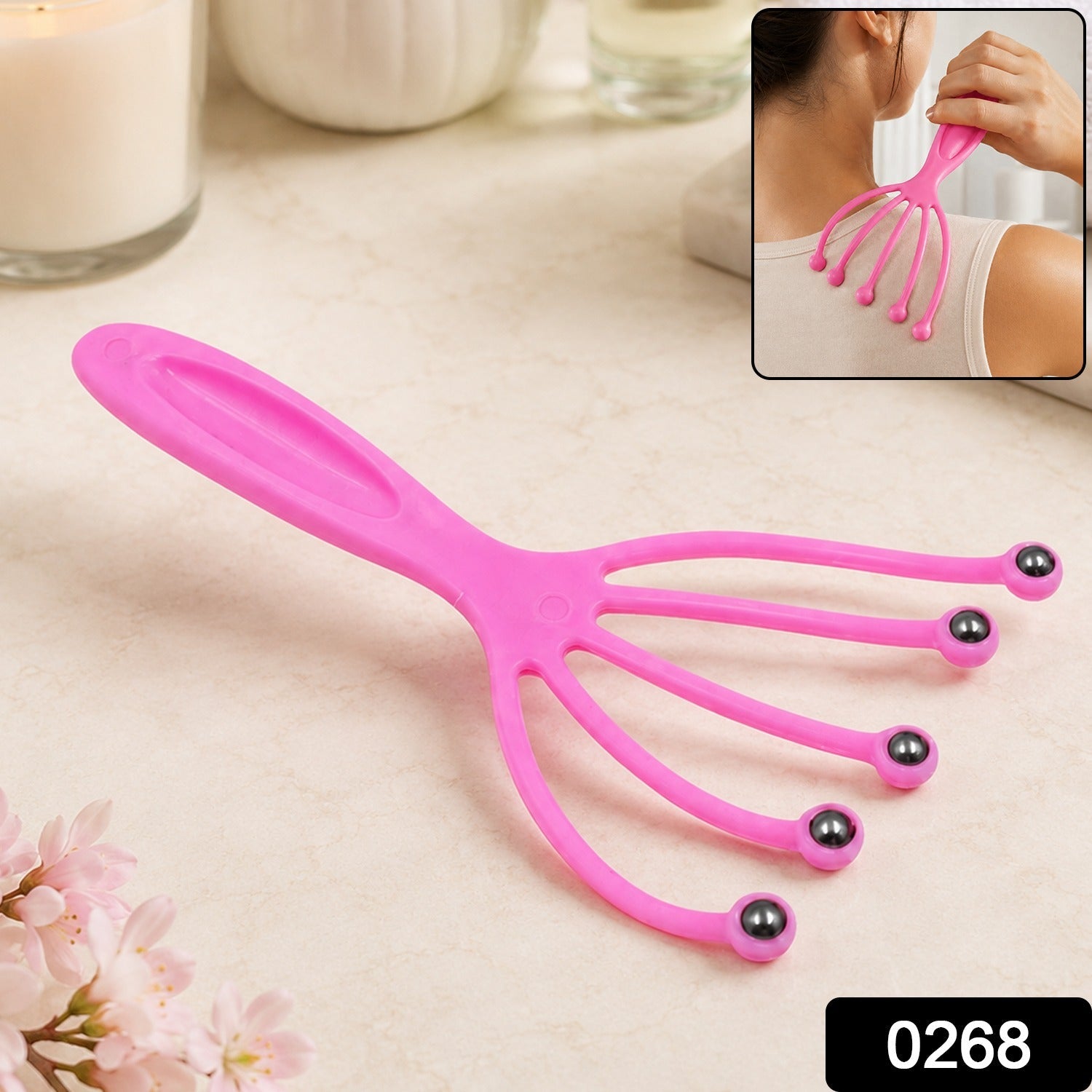 Pink scalp massager tool with five prongs and round bead tips