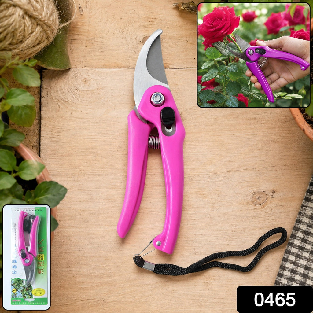Pink pruning scissors with stainless steel blades and black wrist strap, shown with package card