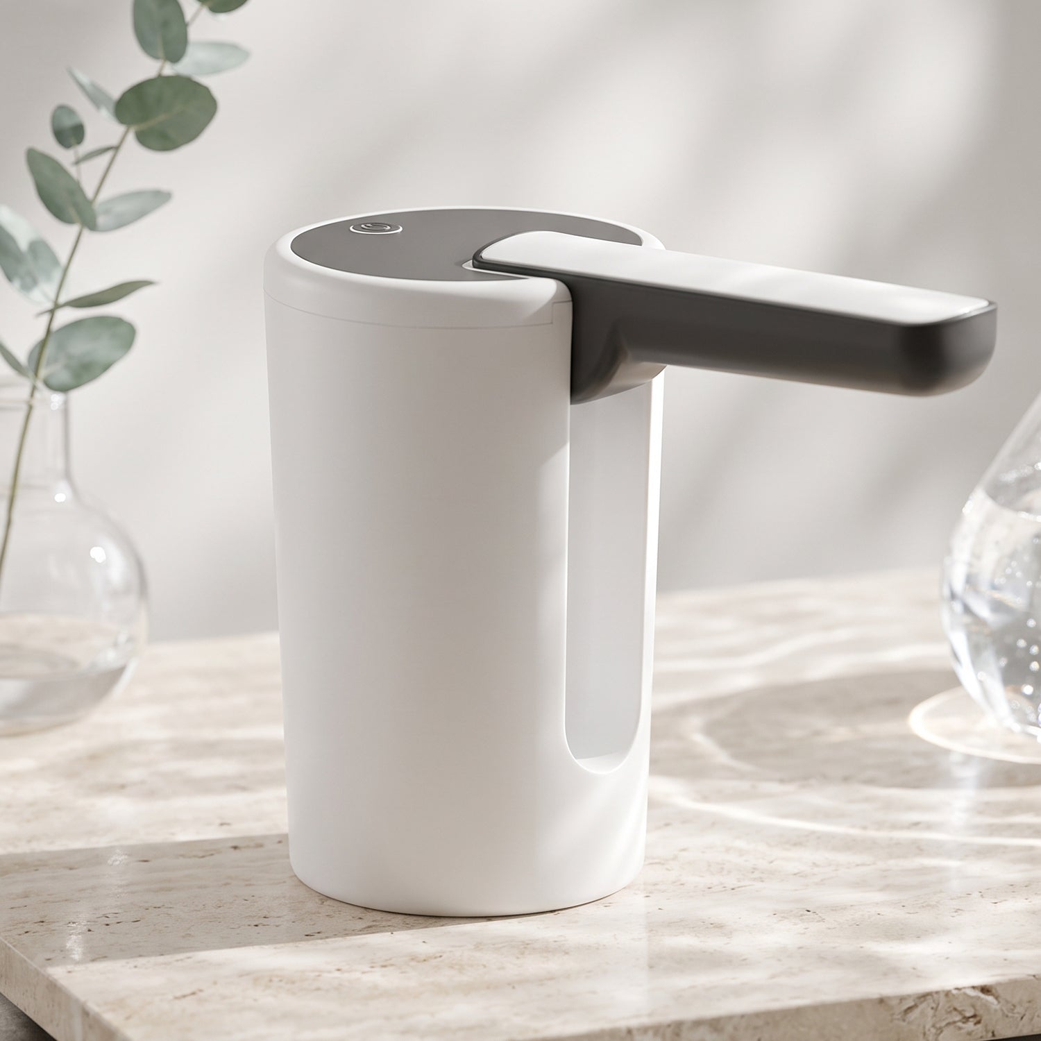 White electric water dispenser pump with horizontal spout on countertop