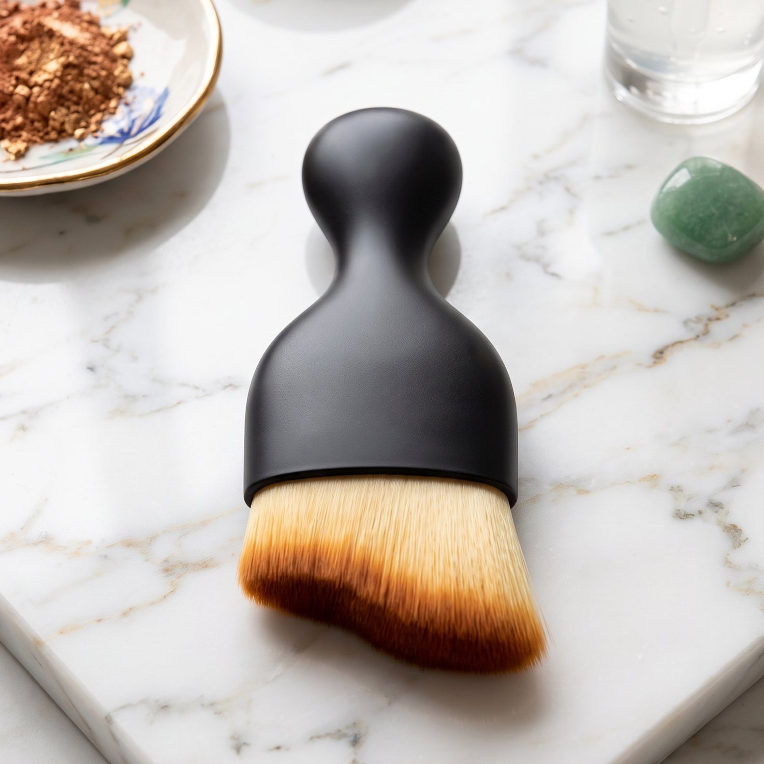 Mini car cleaning brush with black handle and soft tan bristles