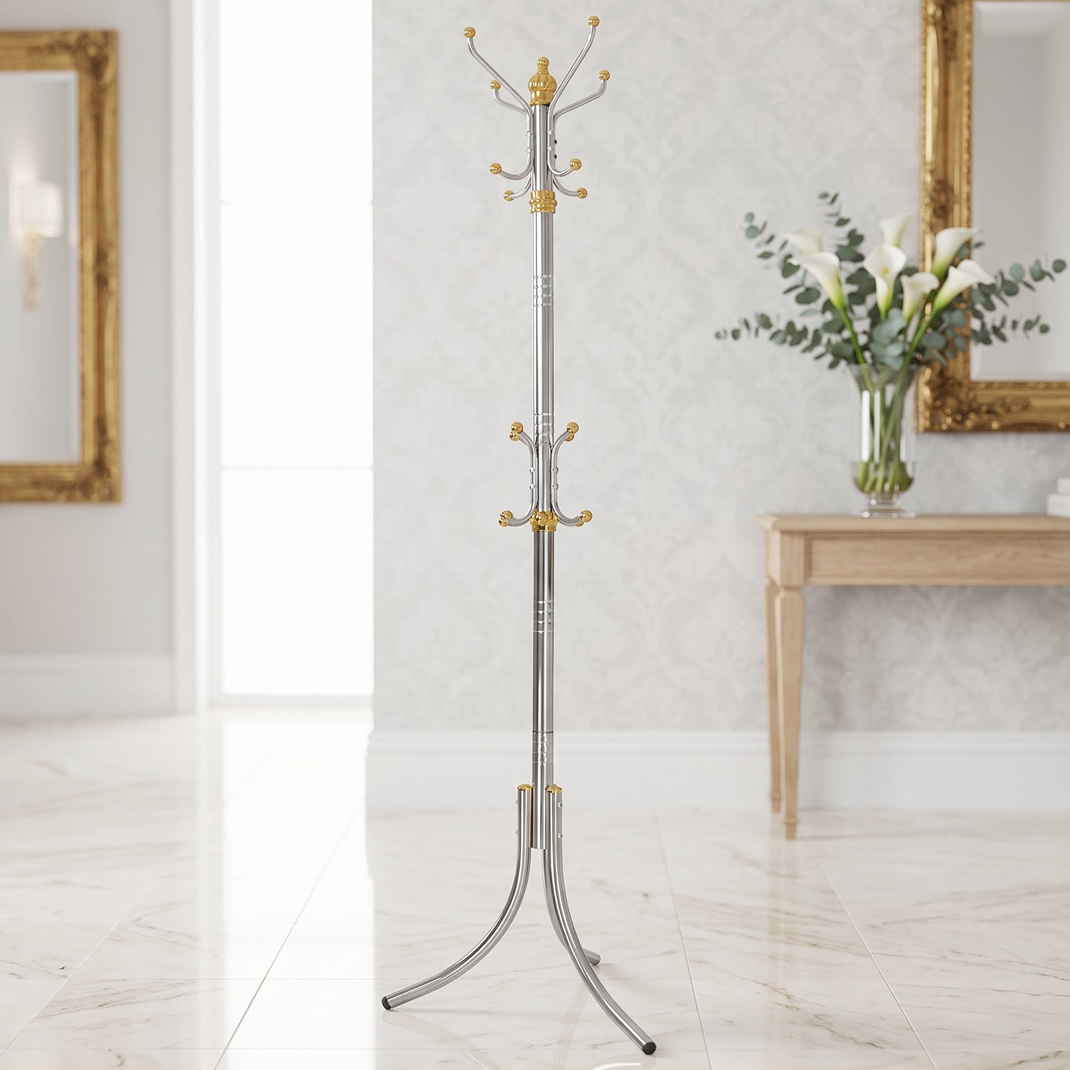 Multi-hook coat rack with gold finials and silver stand, suited for coats and scarves