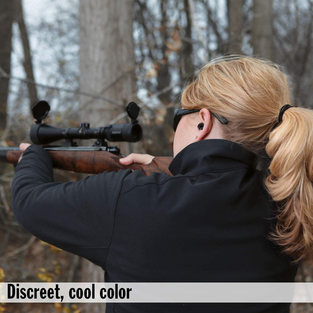 Discreet black soft earplugs in ears for noise reduction
