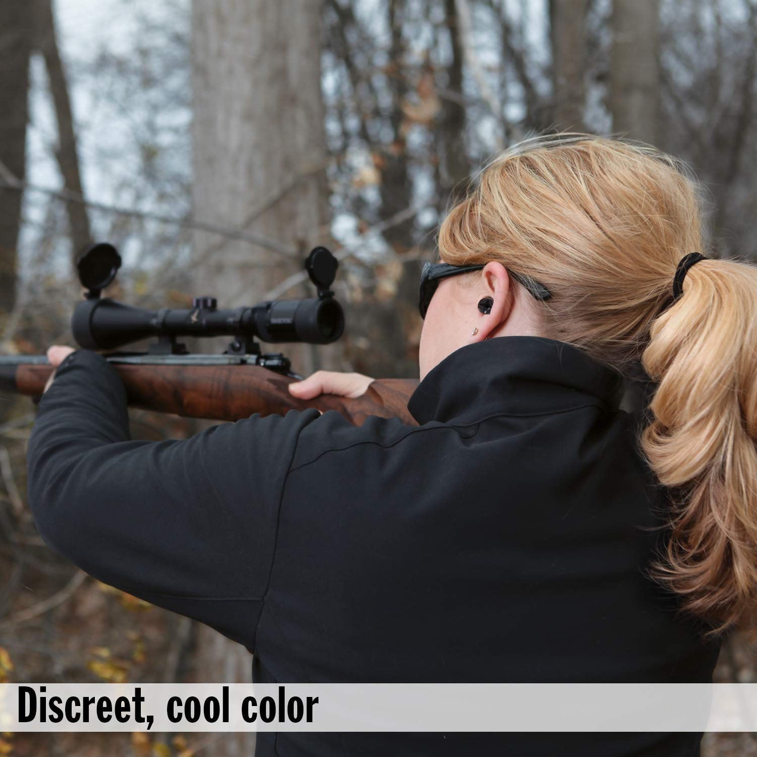 Discreet black soft earplugs in ears for noise reduction