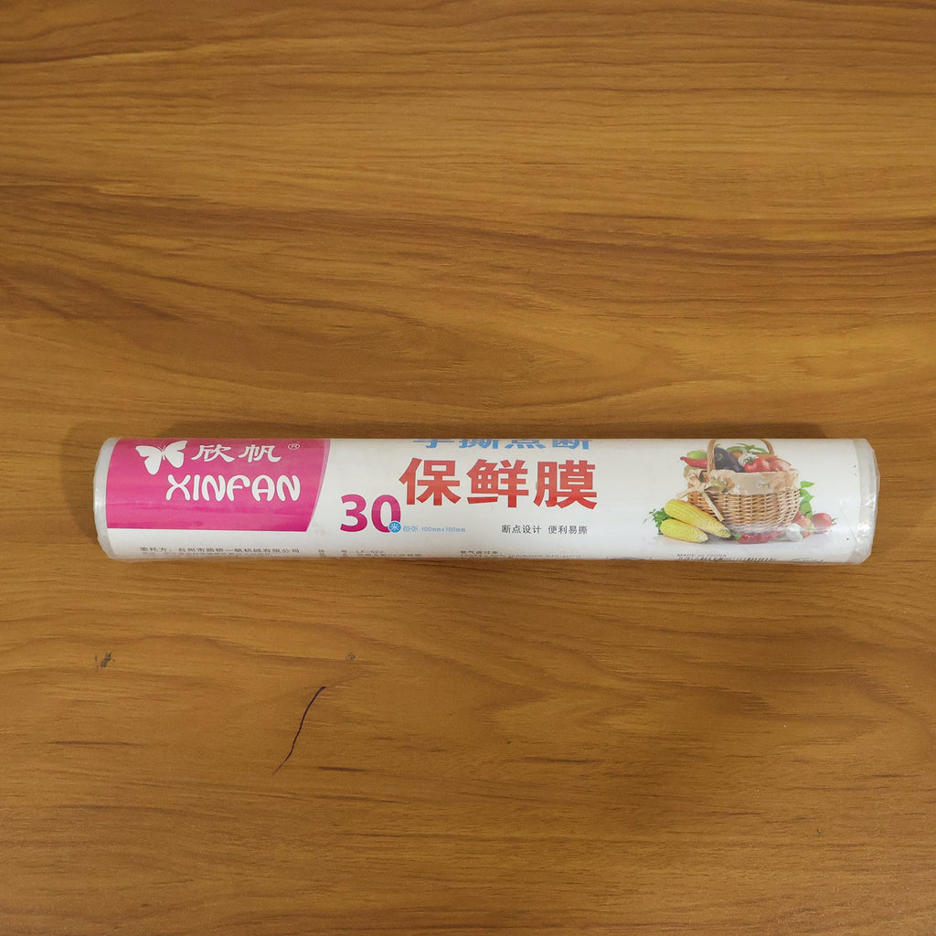 Food-grade cling wrap roll, white plastic wrap with printed 30m label