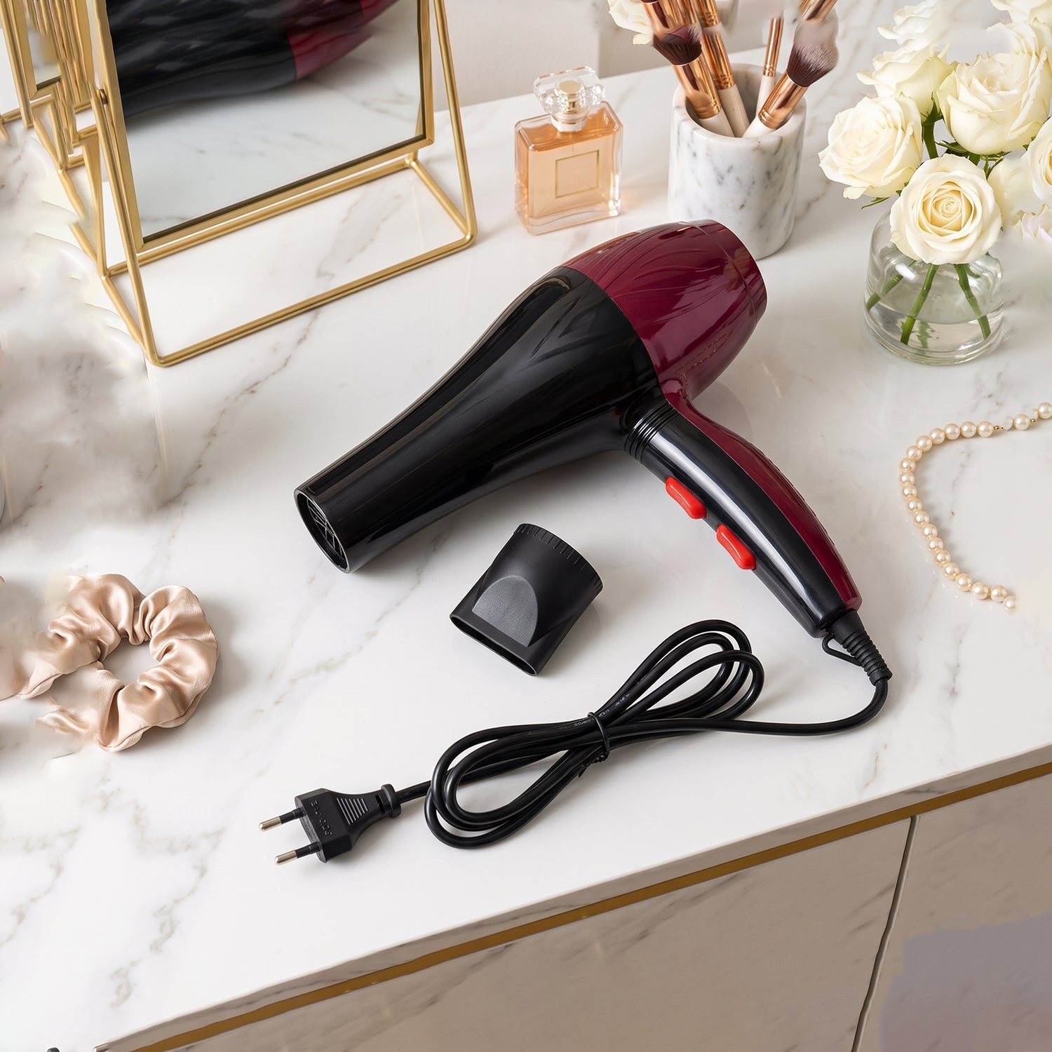 Black and burgundy hair dryer kit with concentrator nozzle and power cord