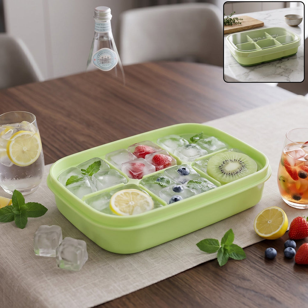 Light green mini ice cube tray with 6 cavities, filled with fruit and ice