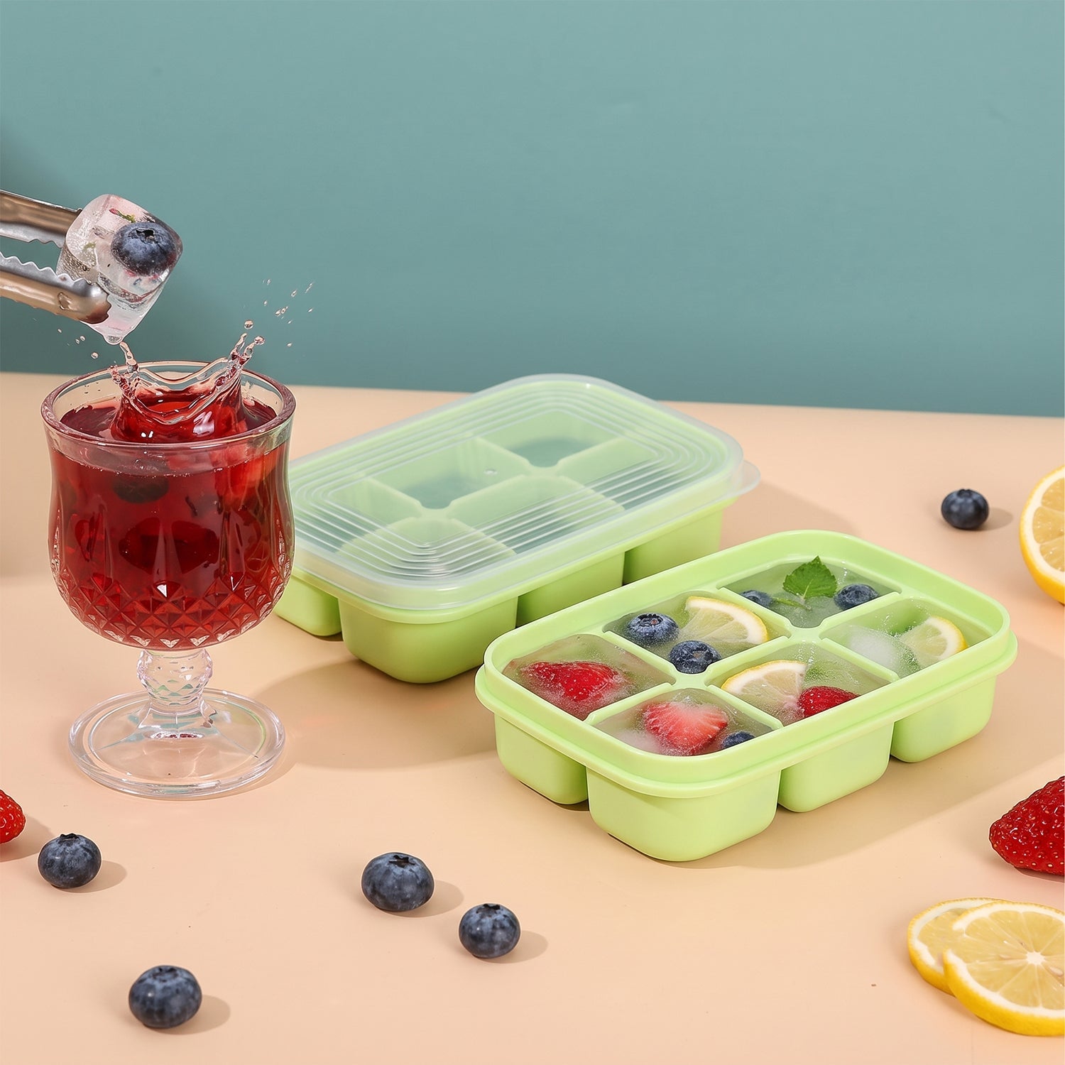 Light green ice cube tray set, one open and one with 6-cavity grid
