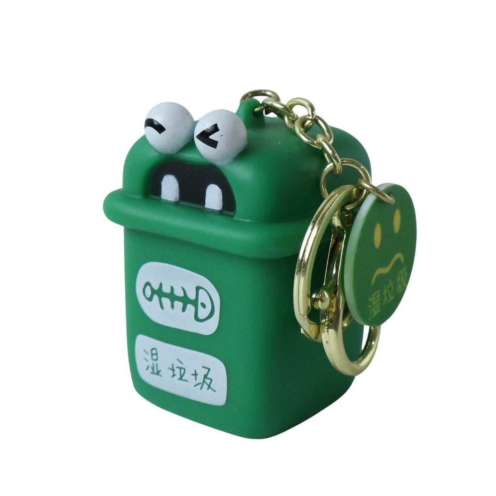Green mini trash can keychain charm with cartoon face, gold rings on chain