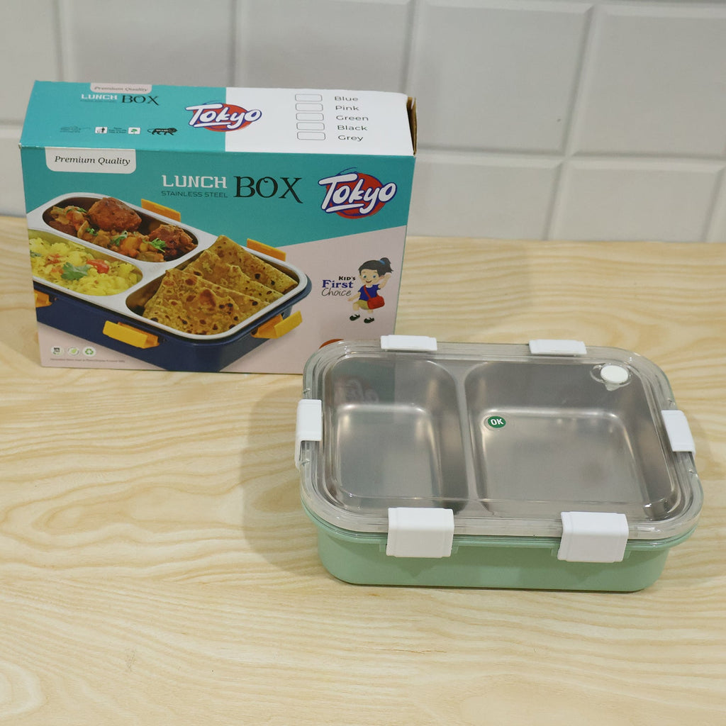 Two-compartment stainless lunch box with clear lid and mint base, with retail box
