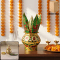 Ornate pooja kalash with green lotus crown and gold-patterned pot base