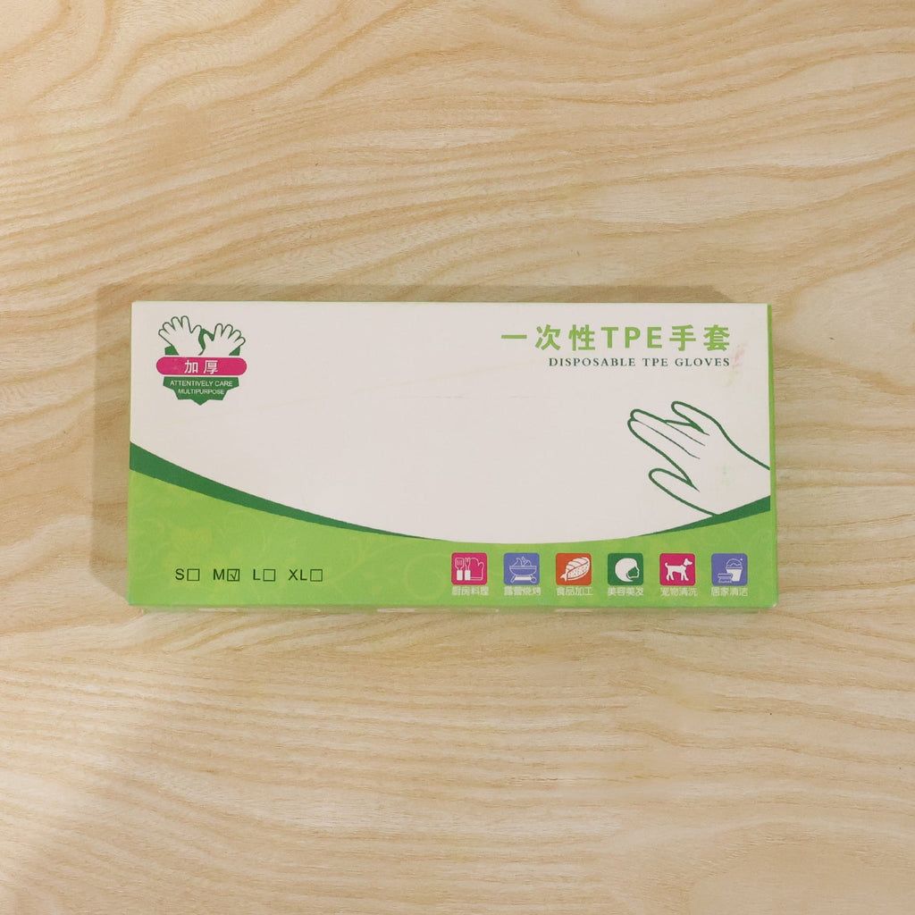 Box of disposable plastic gloves with size options shown