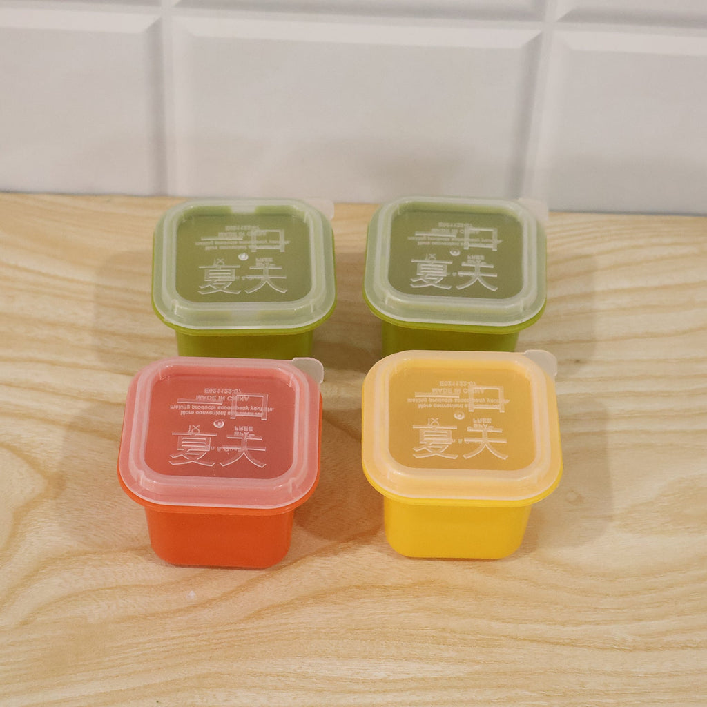 Square ice cube mould set with lids, four multicolor containers with translucent tops