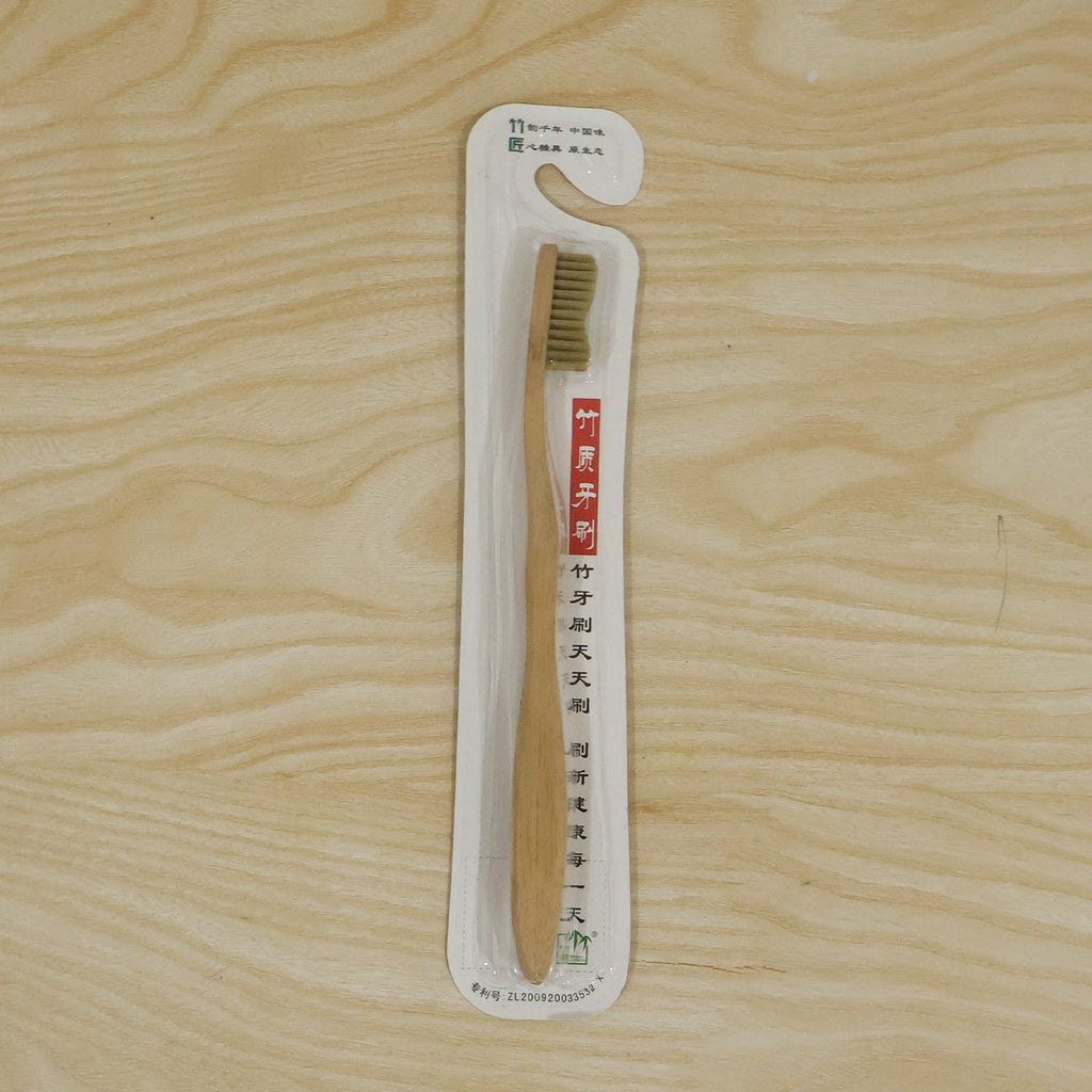 Bamboo toothbrush blister pack with soft bristle head and wooden handle