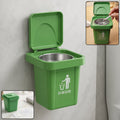 Green mini dustbin-shaped tabletop ashtray with flip lid open, showing metal ash cup