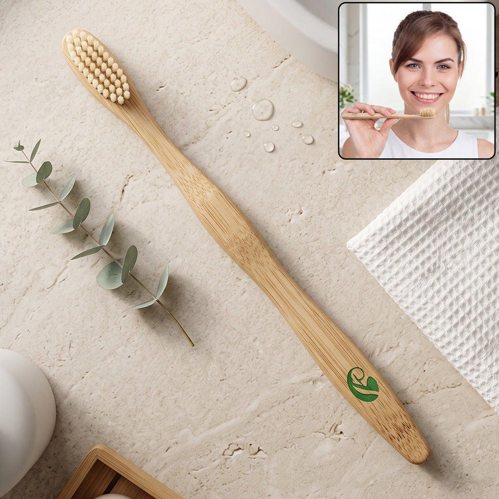 Bamboo toothbrush with soft natural bristles and green leaf logo on the handle