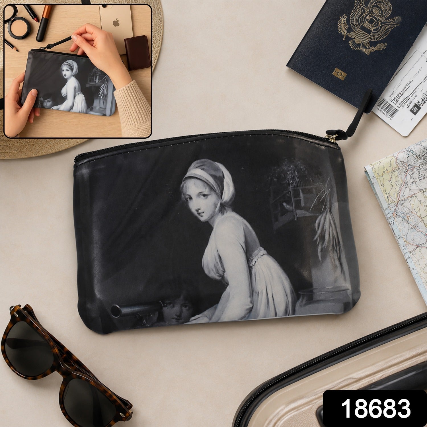 Black zippered travel pouch with monochrome woman print, small hanging loop
