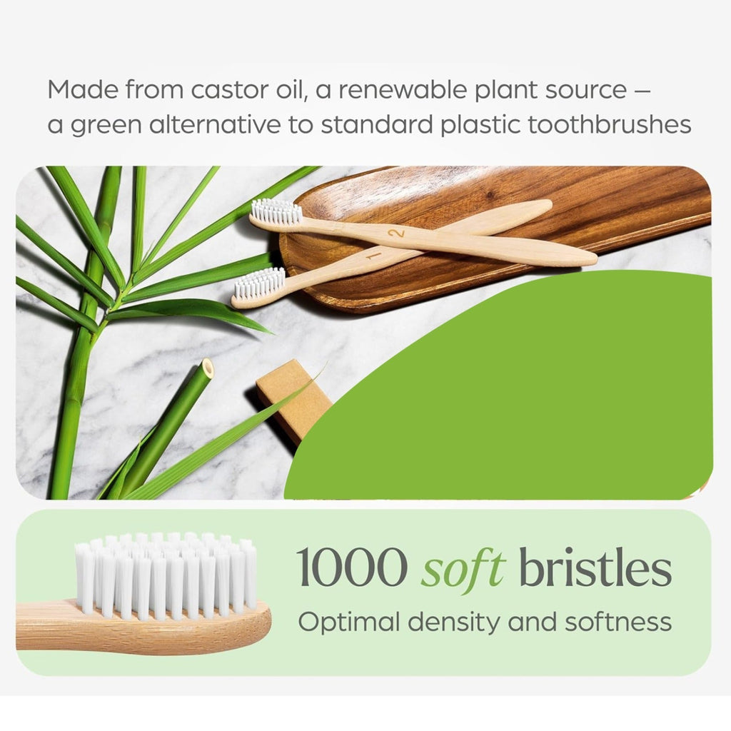 Two bamboo toothbrushes on packaging card, one with white and one with purple bristles