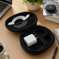 Black hard-shell charging cable and adapter storage case with zip, cable bundle and plug