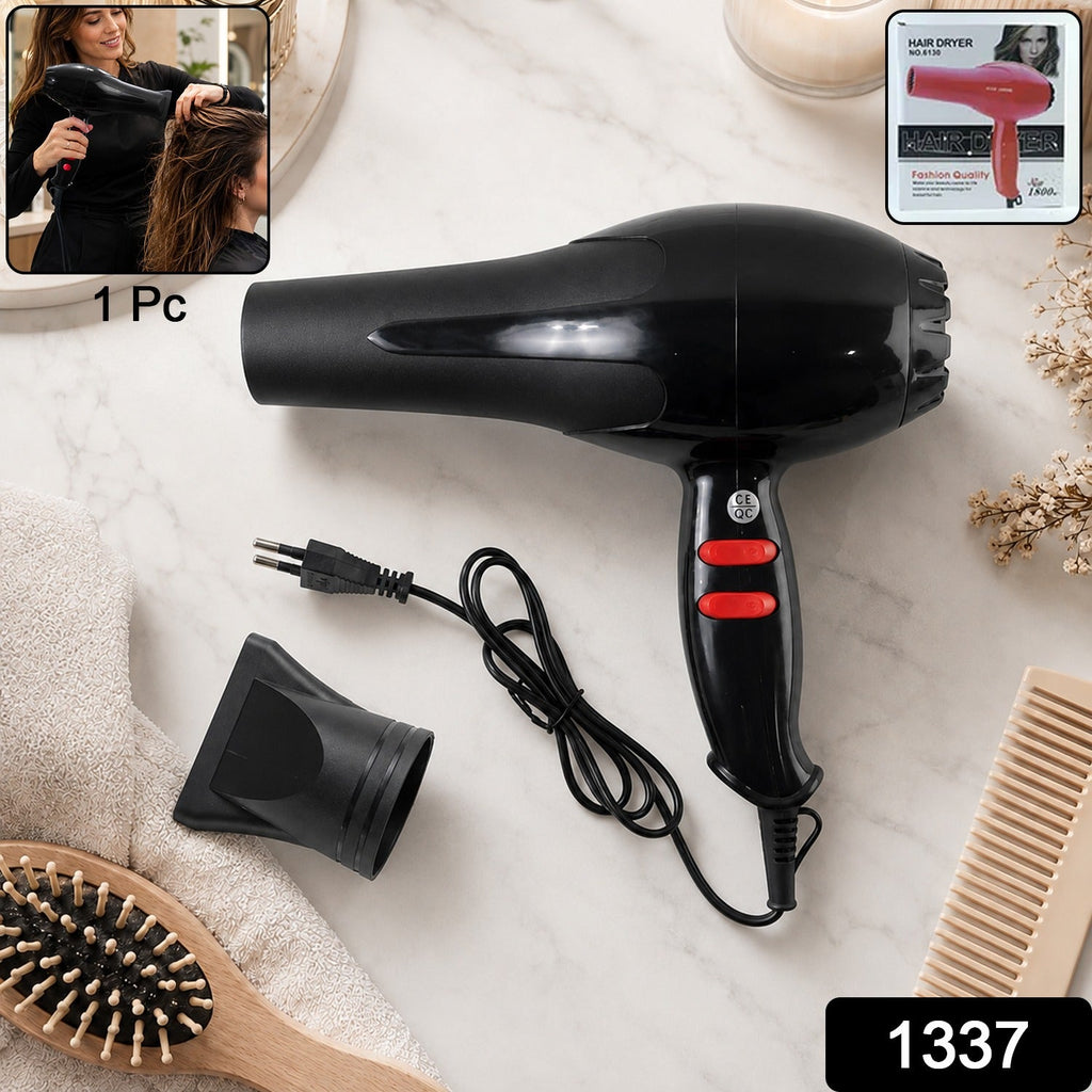 Portable black hair dryer with concentrator nozzle and power cord