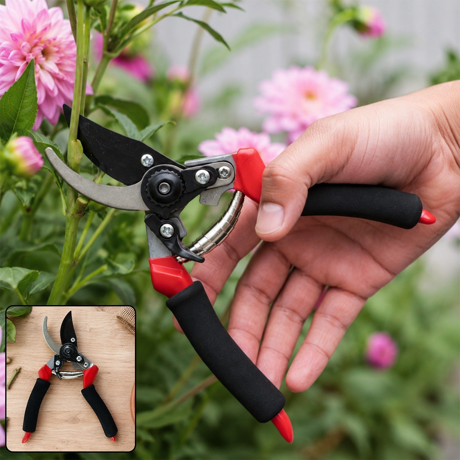 Bypass garden pruner with black handles and red accents, stainless steel cutting blades