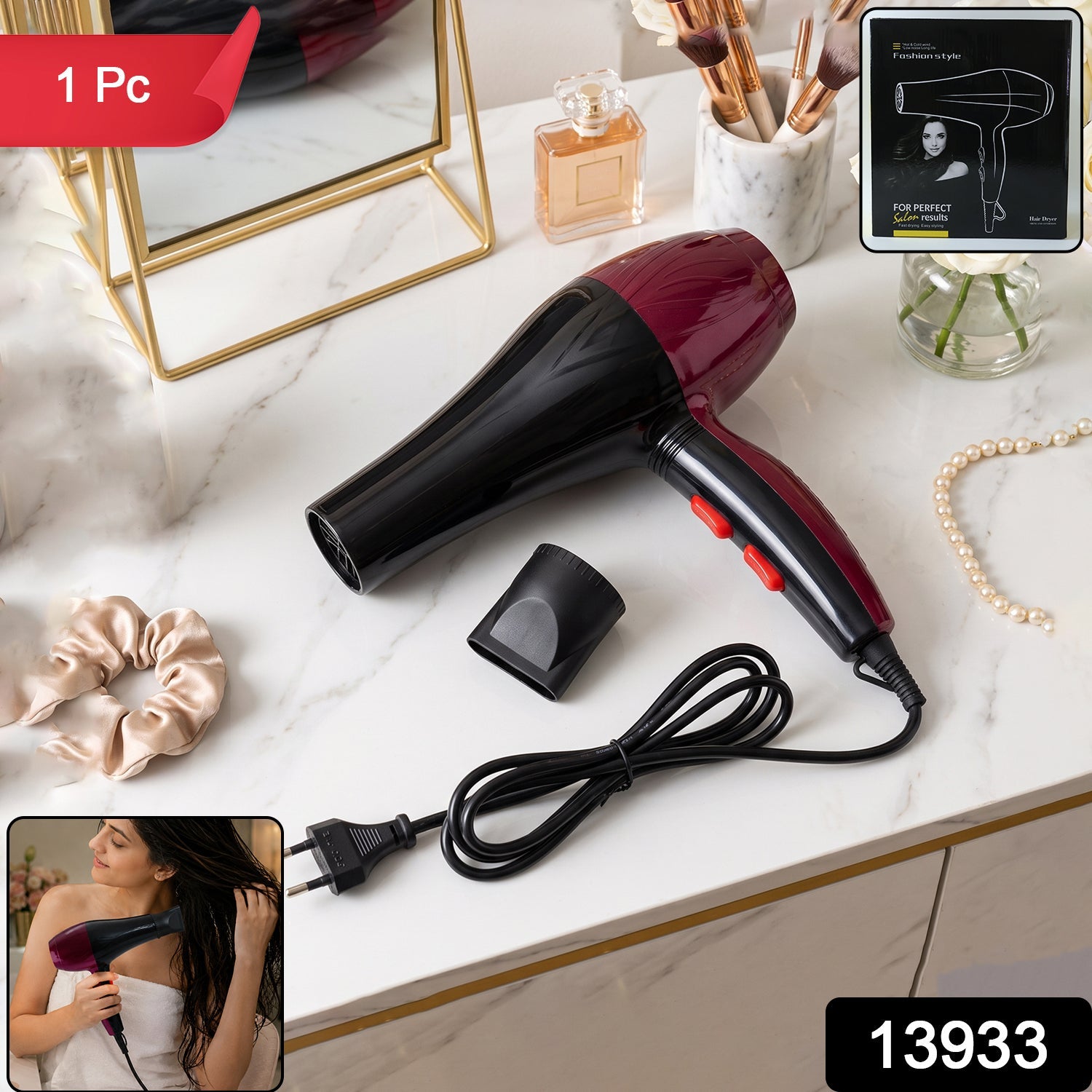 Black and burgundy hair dryer with concentrator nozzle, cord, and red switch