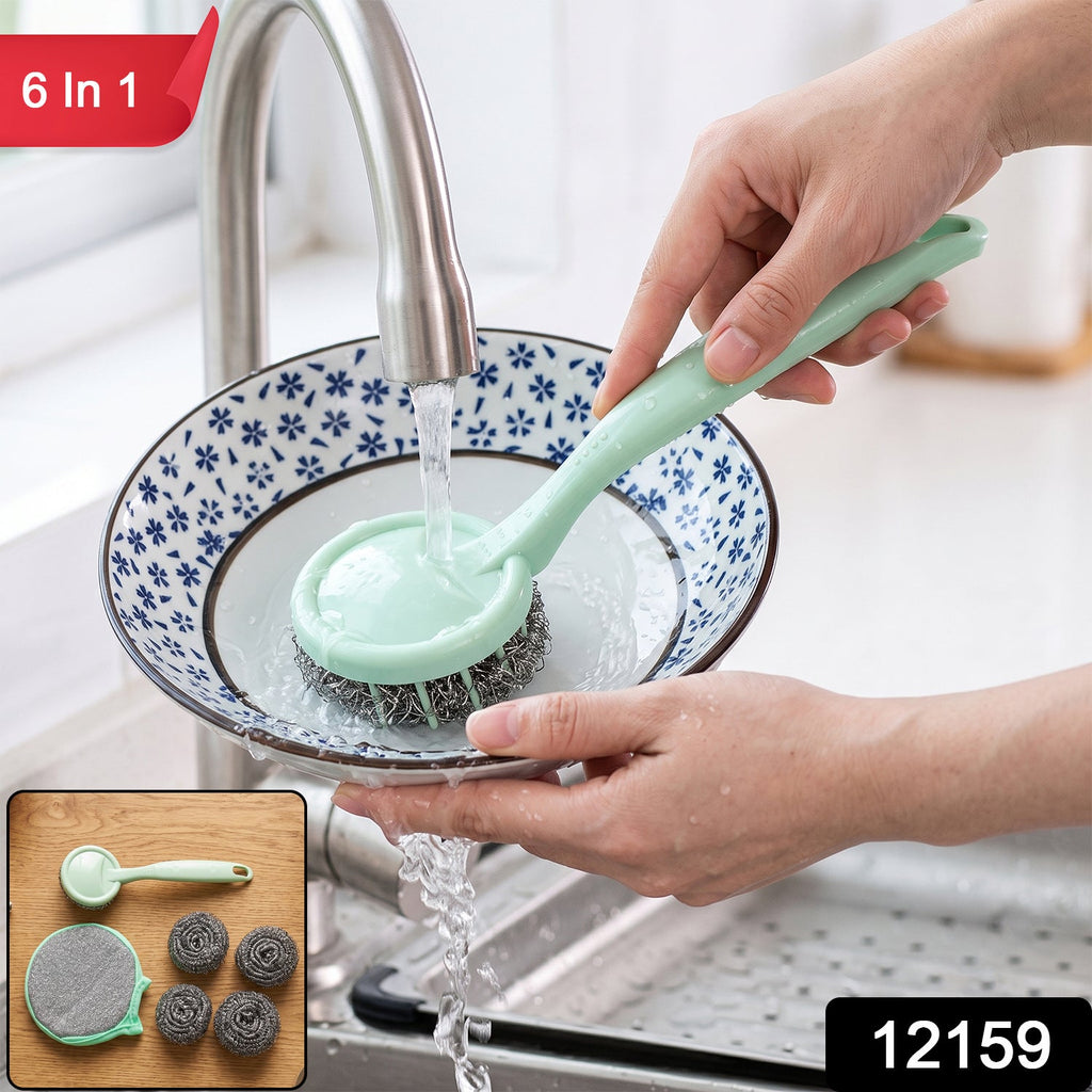 Kitchen sink scrubber with mint handle and stainless steel bristle pad, rinsed in a bowl