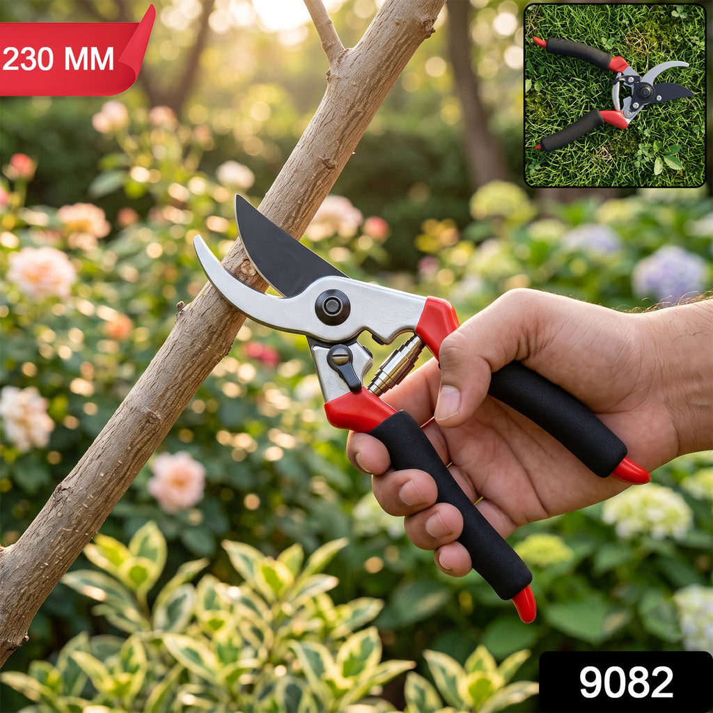 Bypass pruner with red and black handles, sharp metal blades at branch